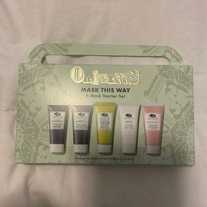 Unopened brand new origins 5- piece mask set